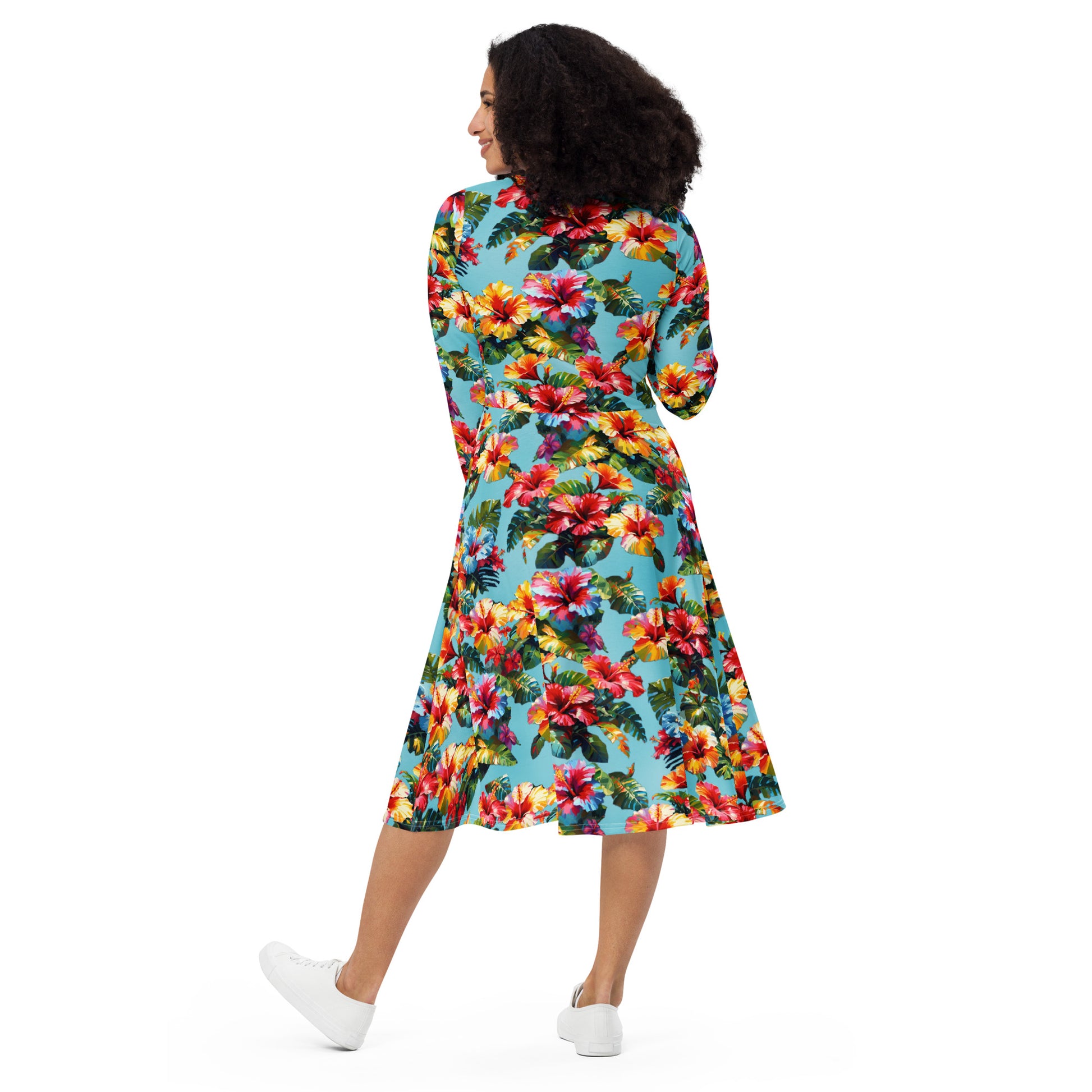 A picture of a woman modeling a Hawaiian Hibiscus Flower patterned long sleeve midi dress - back