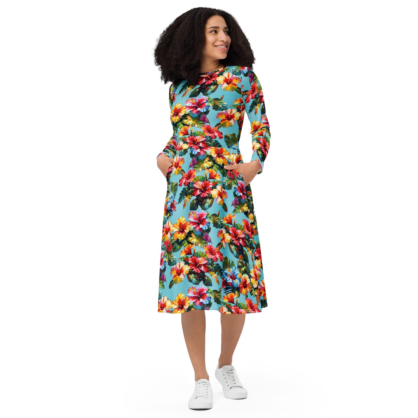 A picture of a woman modeling a Hawaiian Hibiscus Flower patterned long sleeve midi dress - front