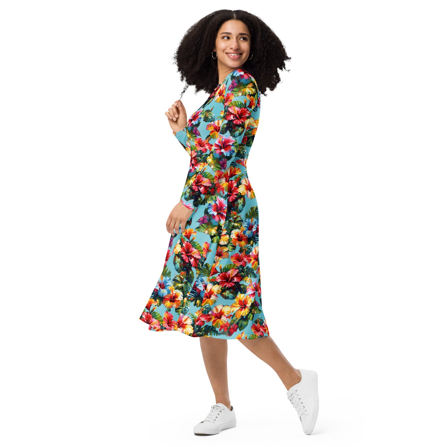A picture of a woman modeling a Hawaiian Hibiscus Flower patterned long sleeve midi dress - left front