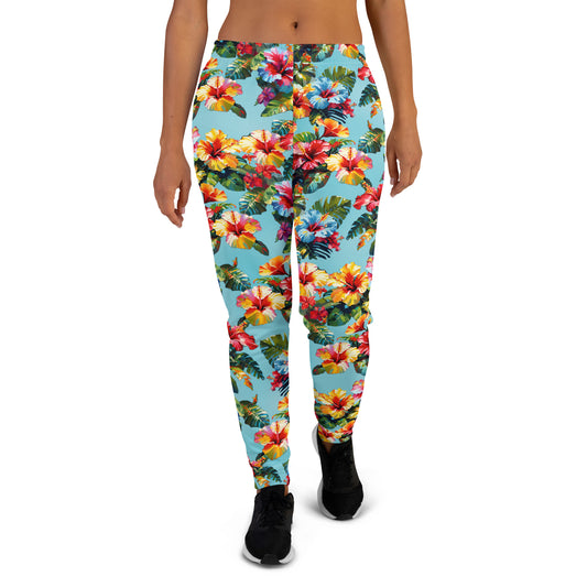 A picture of a woman modeling a Hawaiian Hibiscus Flower pattered Women's Joggers - front