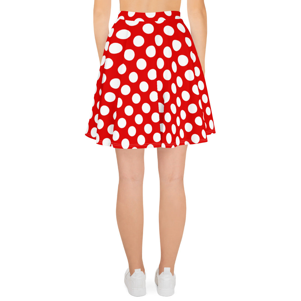 A picture of a woman waist down wearing a Products "Red and White Polka Dot" Skater Skirt and white shoes - back side