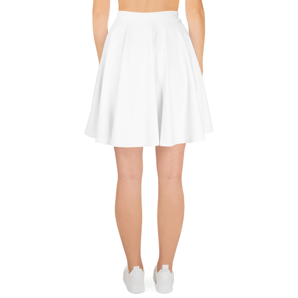 A picture of a woman waist down wearing a Products "White" Skater Skirt and white shoes - back side