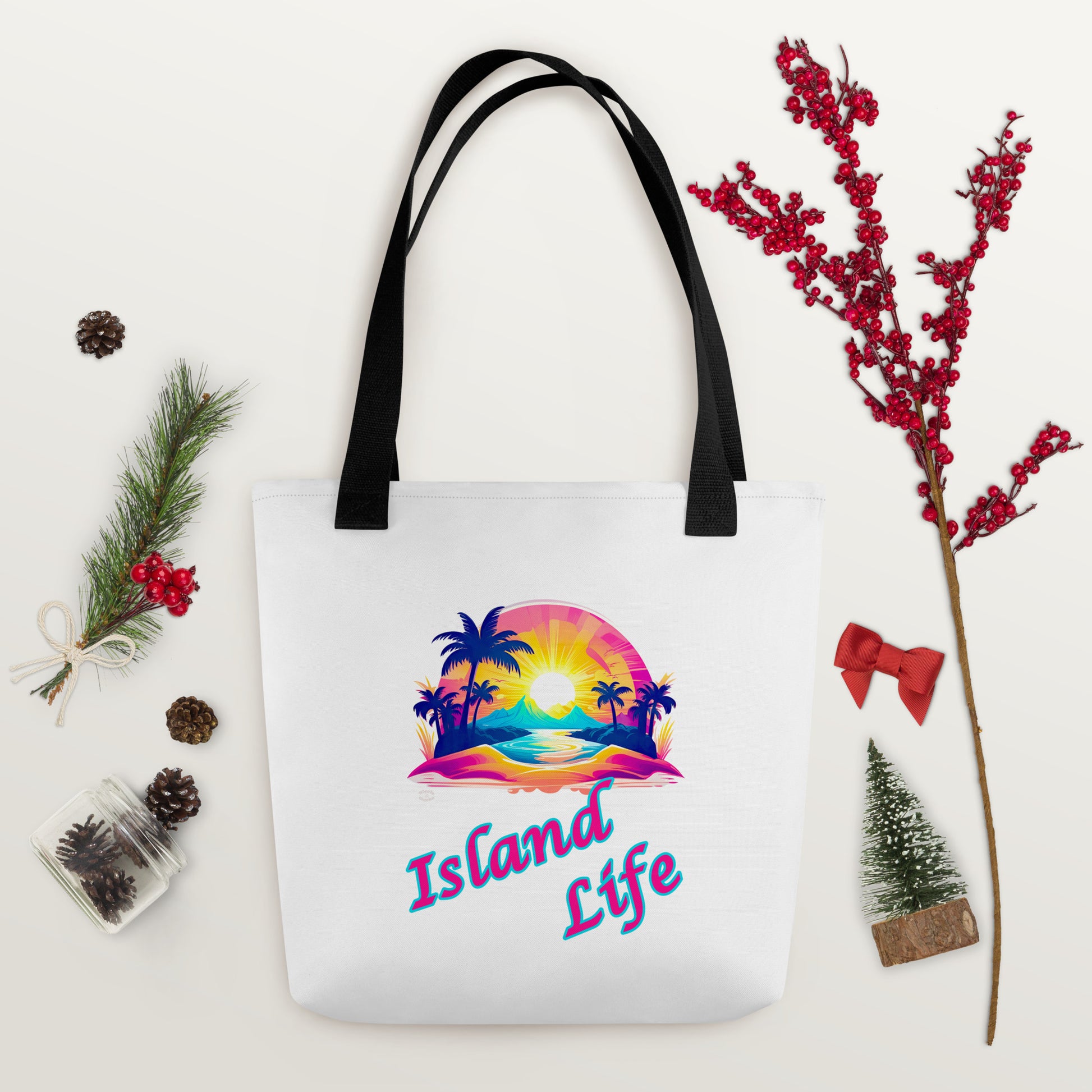 A picture of a Island Life Tote bag with a large picture of a tropical island paradise and the text Island Life underneath - black handles