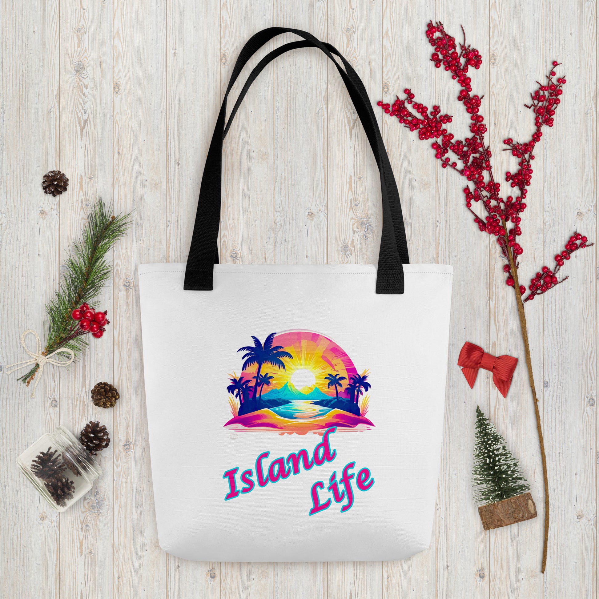 A picture of a Island Life Tote bag with a large picture of a tropical island paradise and the text Island Life underneath - black handles
