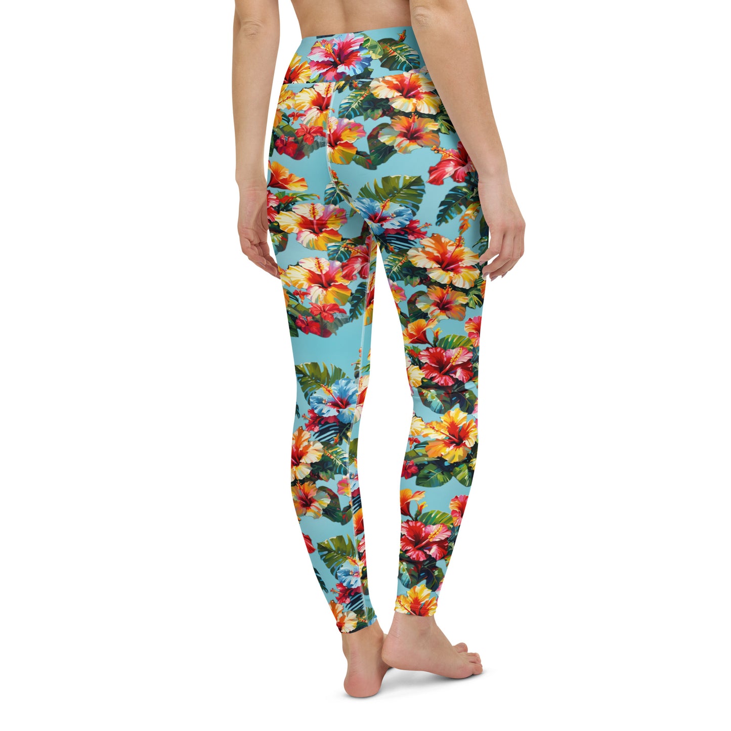 A picture of a woman modeling a Hawaiian Hibiscus Flower patterned Yoga Leggings - back