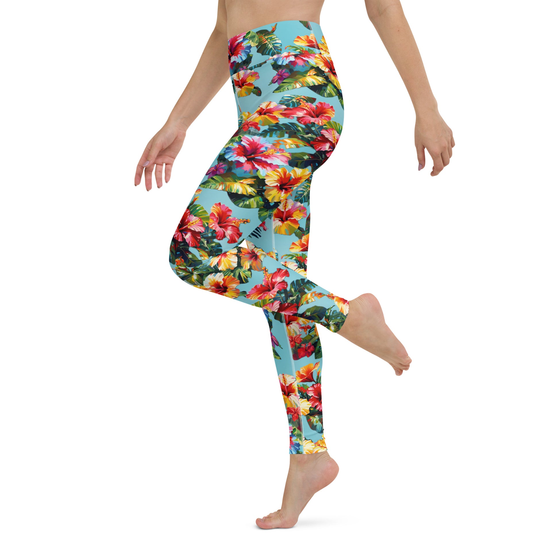 A picture of a woman modeling a Hawaiian Hibiscus Flower patterned Yoga Leggings - left 