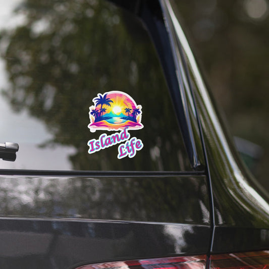 A picture of the back window of a black car with a sticker on the window. The sticker is a colorful picture of a tropical island paradise and the text Island Life underneath - 5.5 inch
