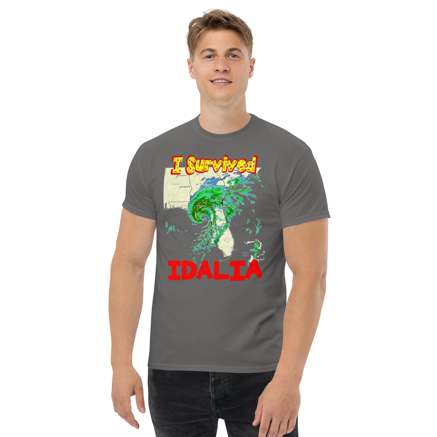 A picture of a man wearing a tshirt with I SURVIVED Hurricane IDALIA Unisex T-Shirt - in charcoal