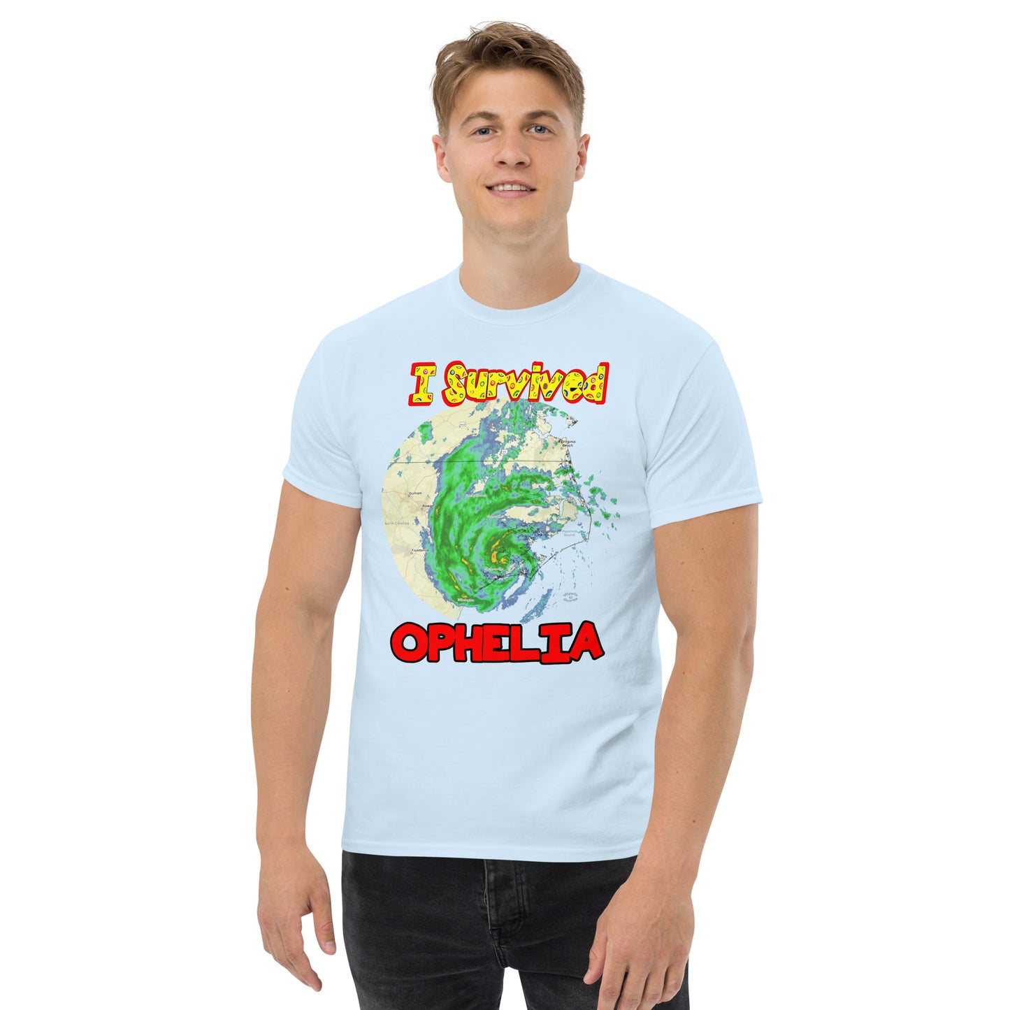 A picture of a man modeling a I Survived Hurricane Ophelia Men's Classic Tee with a large picture on the front of tropical storm Ophelia and the text I Survived Ophelia - light blue