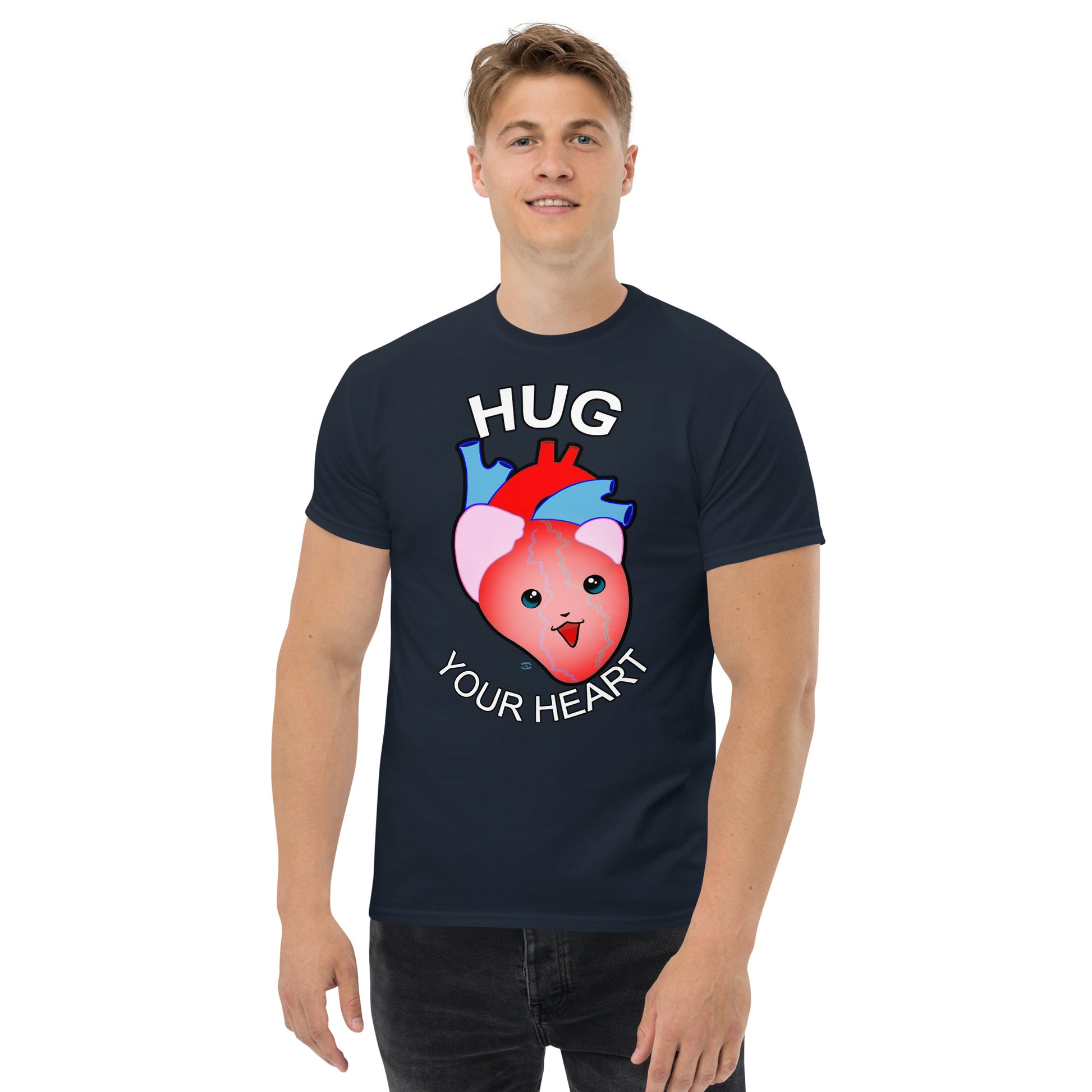 A Picture of a man wearing a short sleeved tshirt with a picture on the front of a smiling heart with the text "HUG Your Heart" - color navy blue