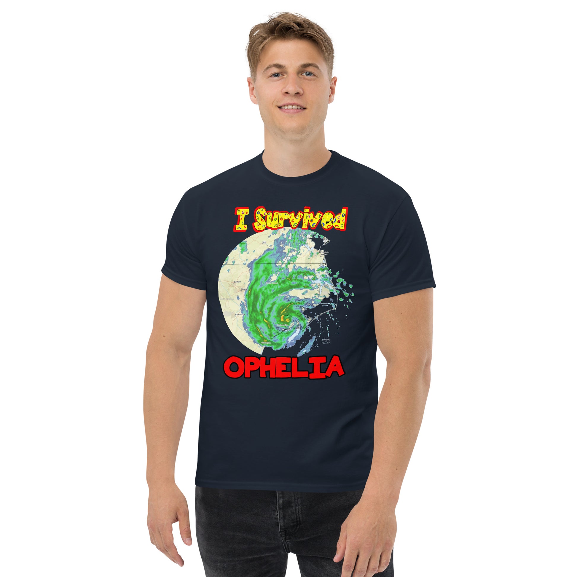 A picture of a man modeling a I Survived Hurricane Ophelia Men's Classic Tee with a large picture on the front of tropical storm Ophelia and the text I Survived Ophelia - navy blue