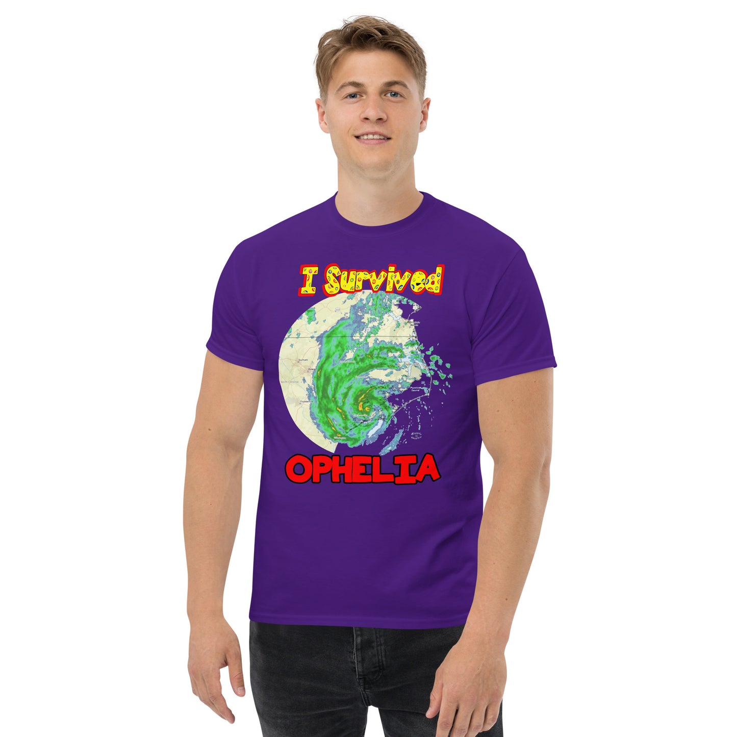 A picture of a man modeling a I Survived Hurricane Ophelia Men's Classic Tee with a large picture on the front of tropical storm Ophelia and the text I Survived Ophelia - purple