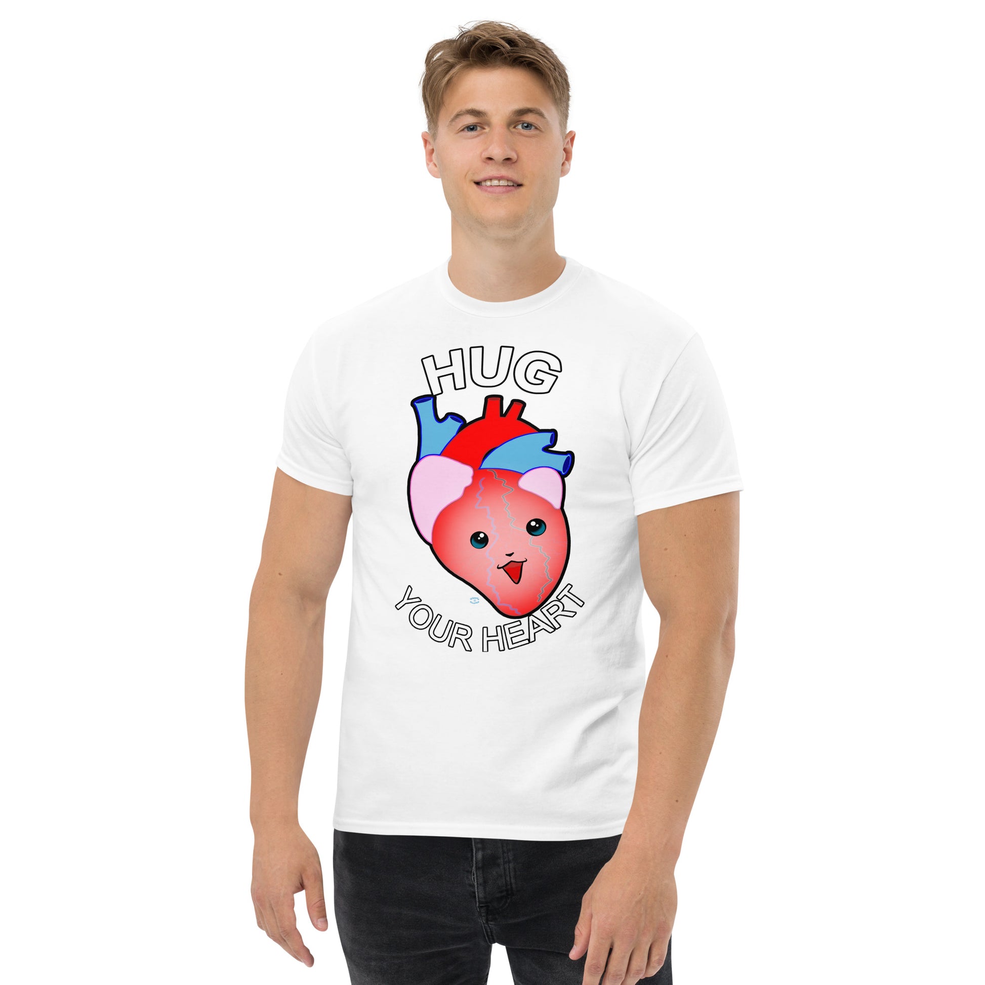 A Picture of a man wearing a short sleeved tshirt with a picture on the front of a smiling heart with the text "HUG Your Heart" - color white
