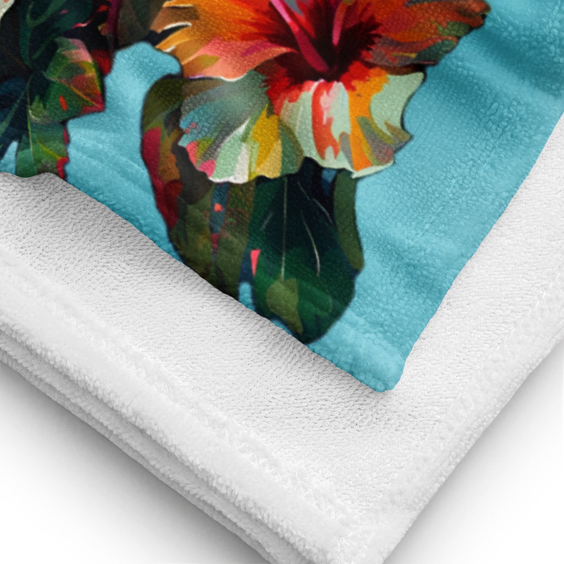 A picture of a Hawaiian Hibiscus Flower patterned Beach Towel folded showing the front and back - 30 x 60 inch - front