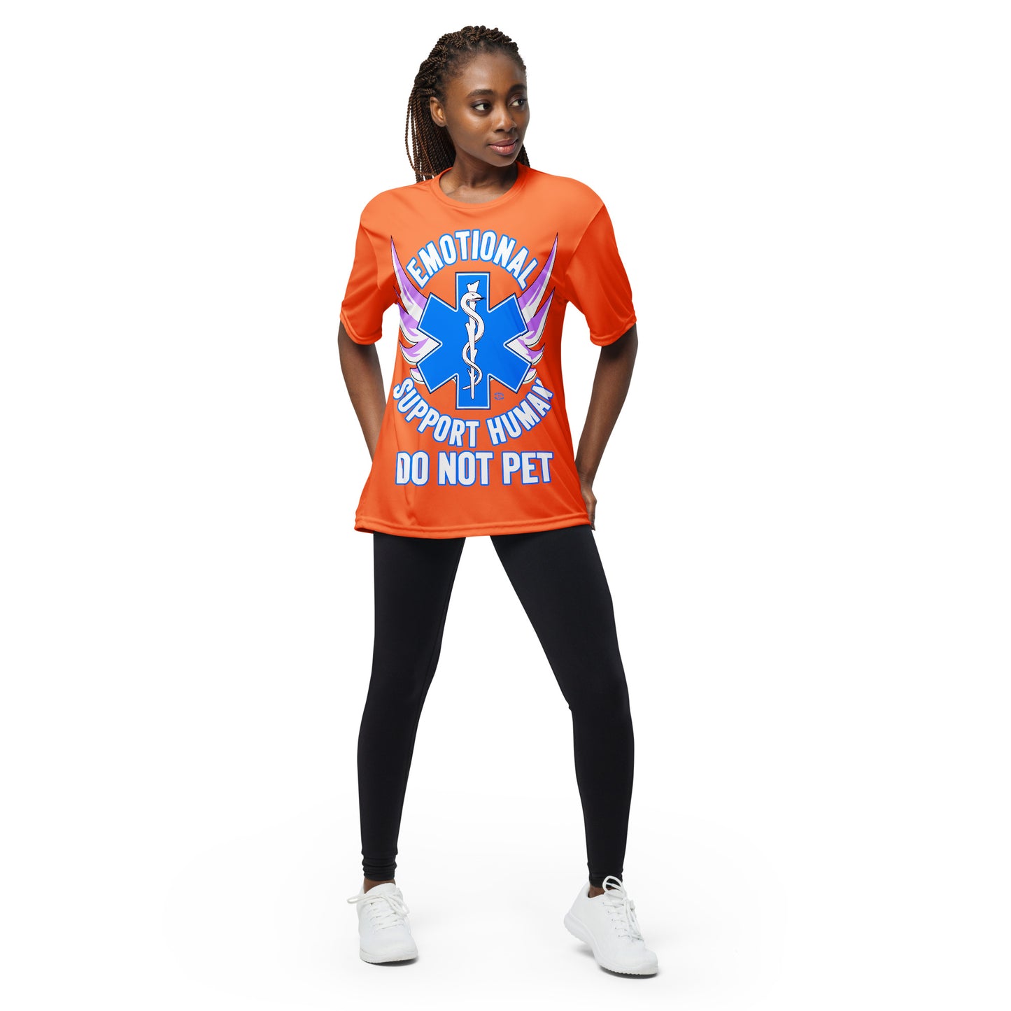 A woman wearing a tshirt with a big blue cross and a Rod of Asclepius inside. Text around the cross says Emotional Support Human DO NOT PET - safety orange