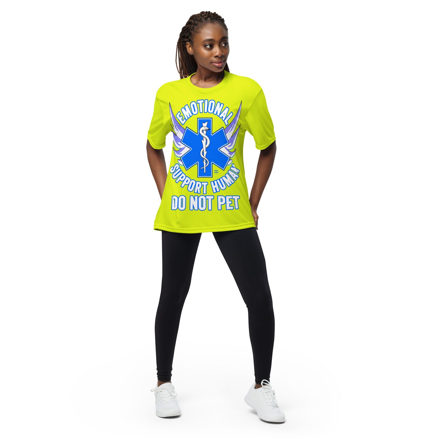 A woman wearing a tshirt with a big blue cross and a Rod of Asclepius inside. Text around the cross says Emotional Support Human DO NOT PET - safety yellow