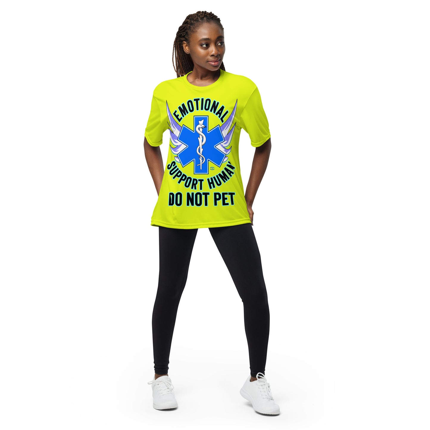 A woman wearing a tshirt with a big blue cross and a Rod of Asclepius inside. Text around the cross says Emotional Support Human DO NOT PET - safety yellow  