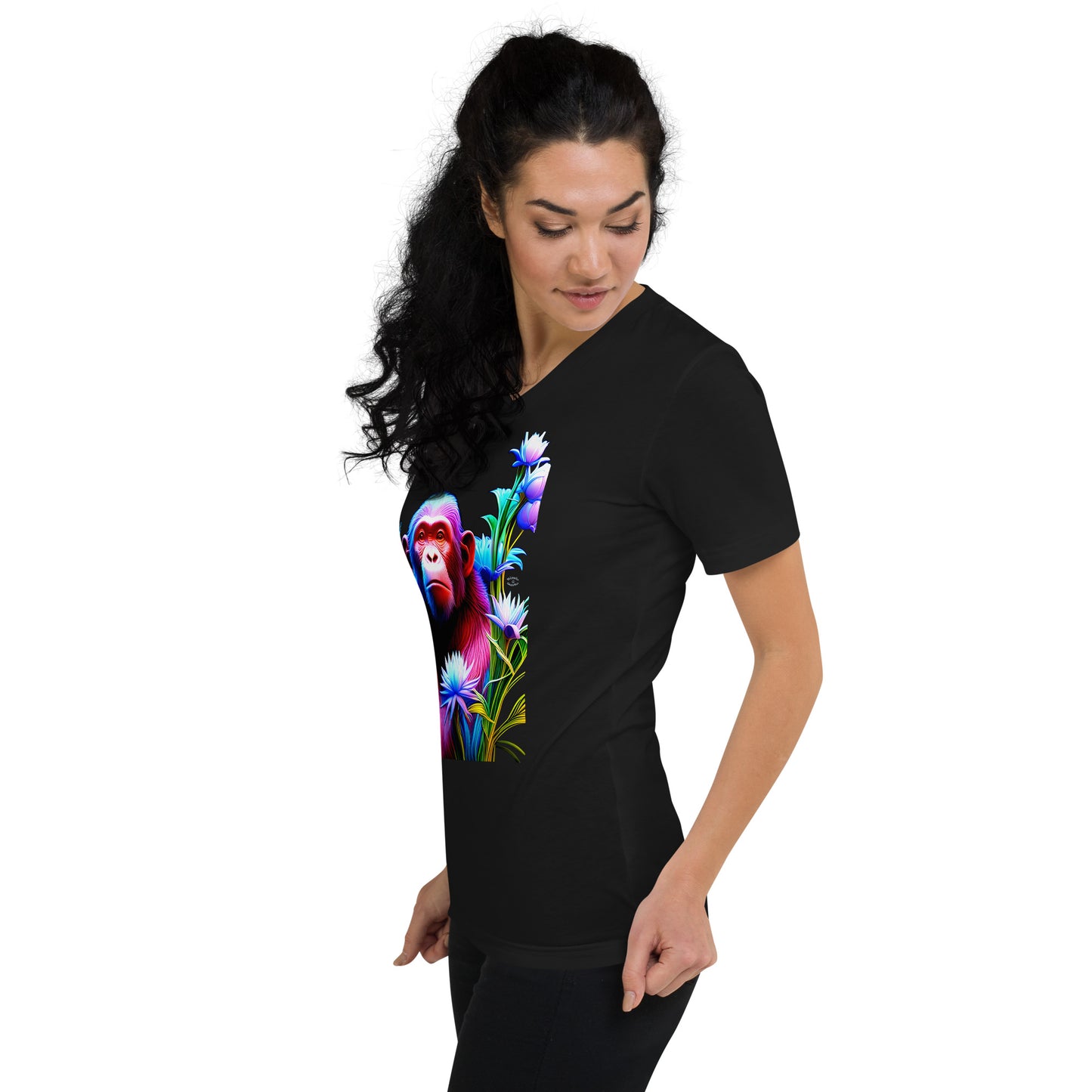 A picture of a woman wearing a v-neck short sleeve tshirt with a picture of a very colorful chimpanzee and flowers on the front - black - left front side