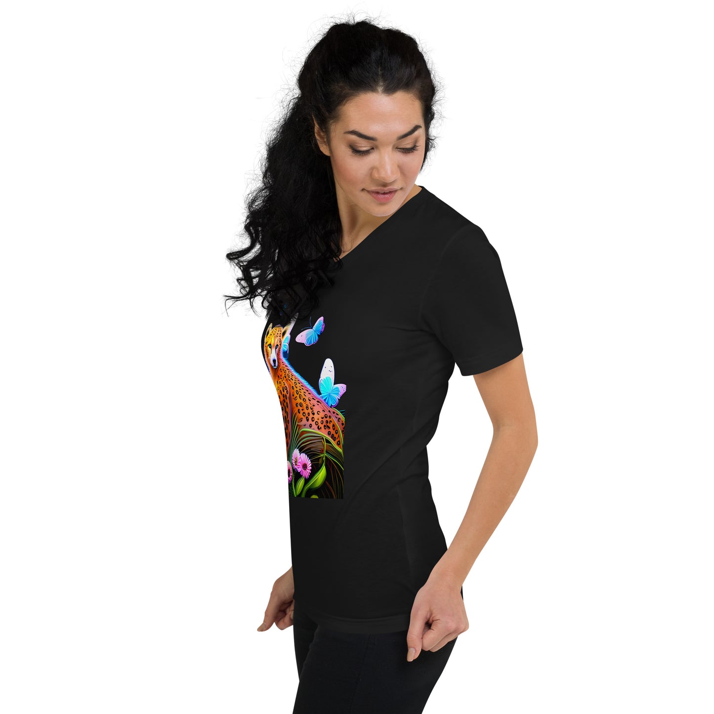 A picture of a woman wearing a tshirt with a cheetah surrounded by butterflies and sitting in colorful flowers - black left front