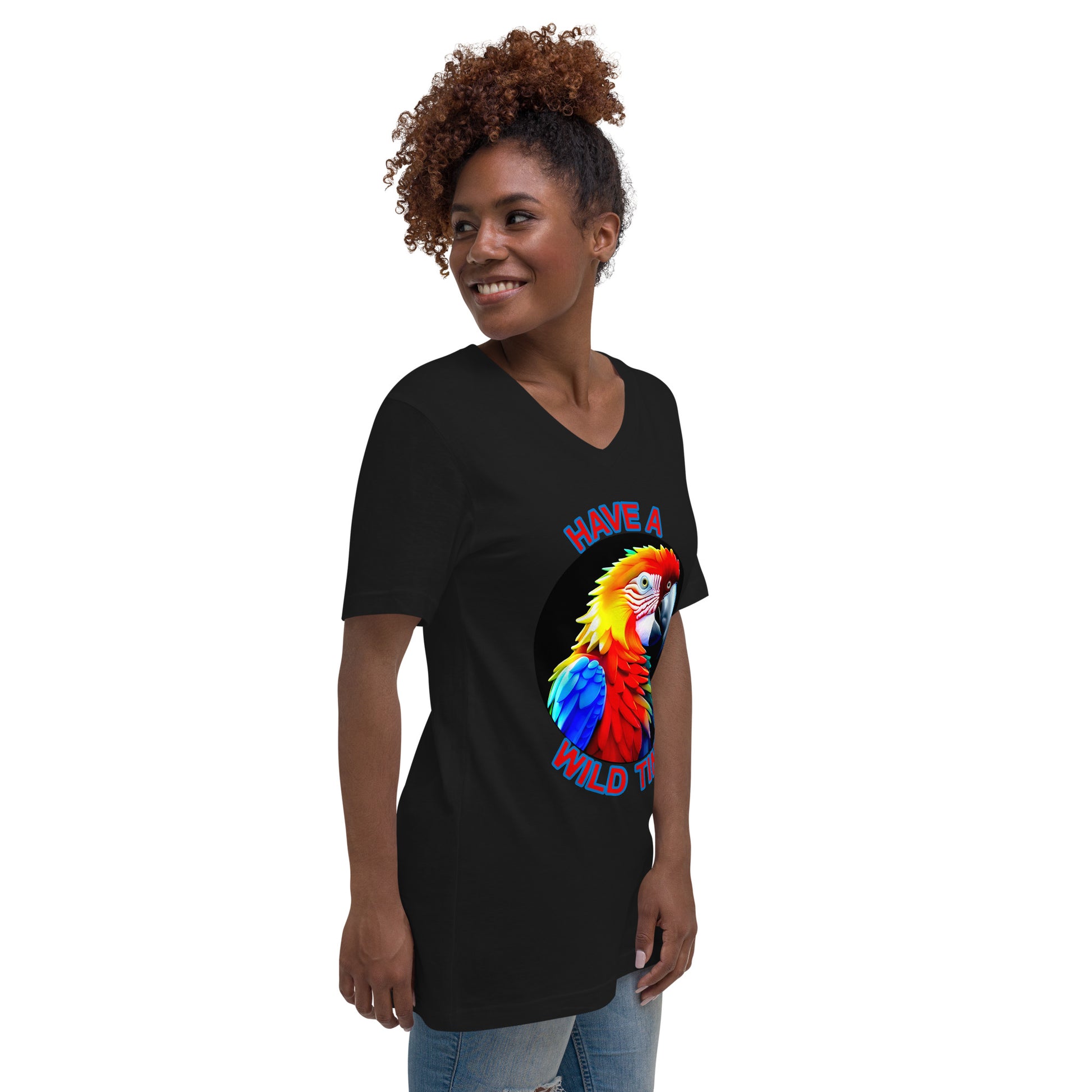 A picture of a women wearing a tshirt with the picture of a bright and colorful rainbow macaw parrot and the text HAVE A WILD TIME - black right front