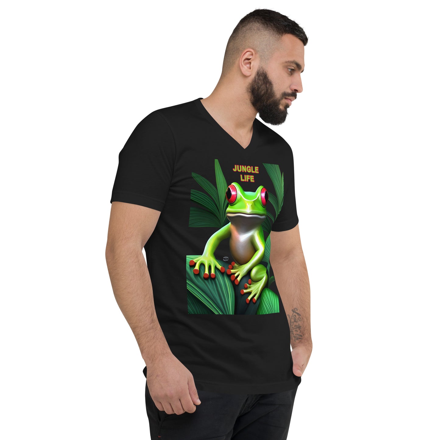 A picture of a man wearing a tshirt with a green frog poking through some leaves and the text JUNGLE LIFE - black right front