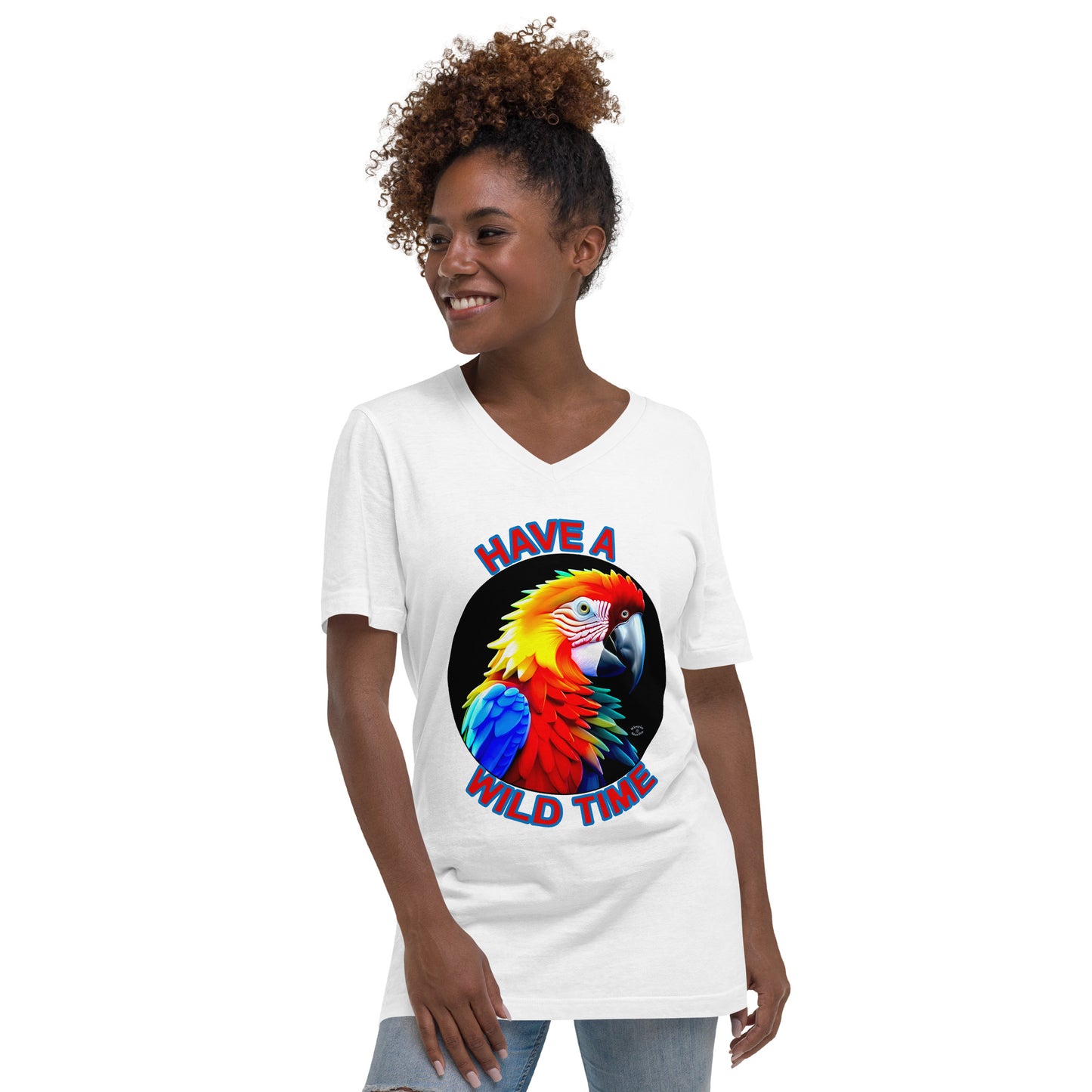 A picture of a women wearing a tshirt with the picture of a bright and colorful rainbow macaw parrot and the text HAVE A WILD TIME - white front