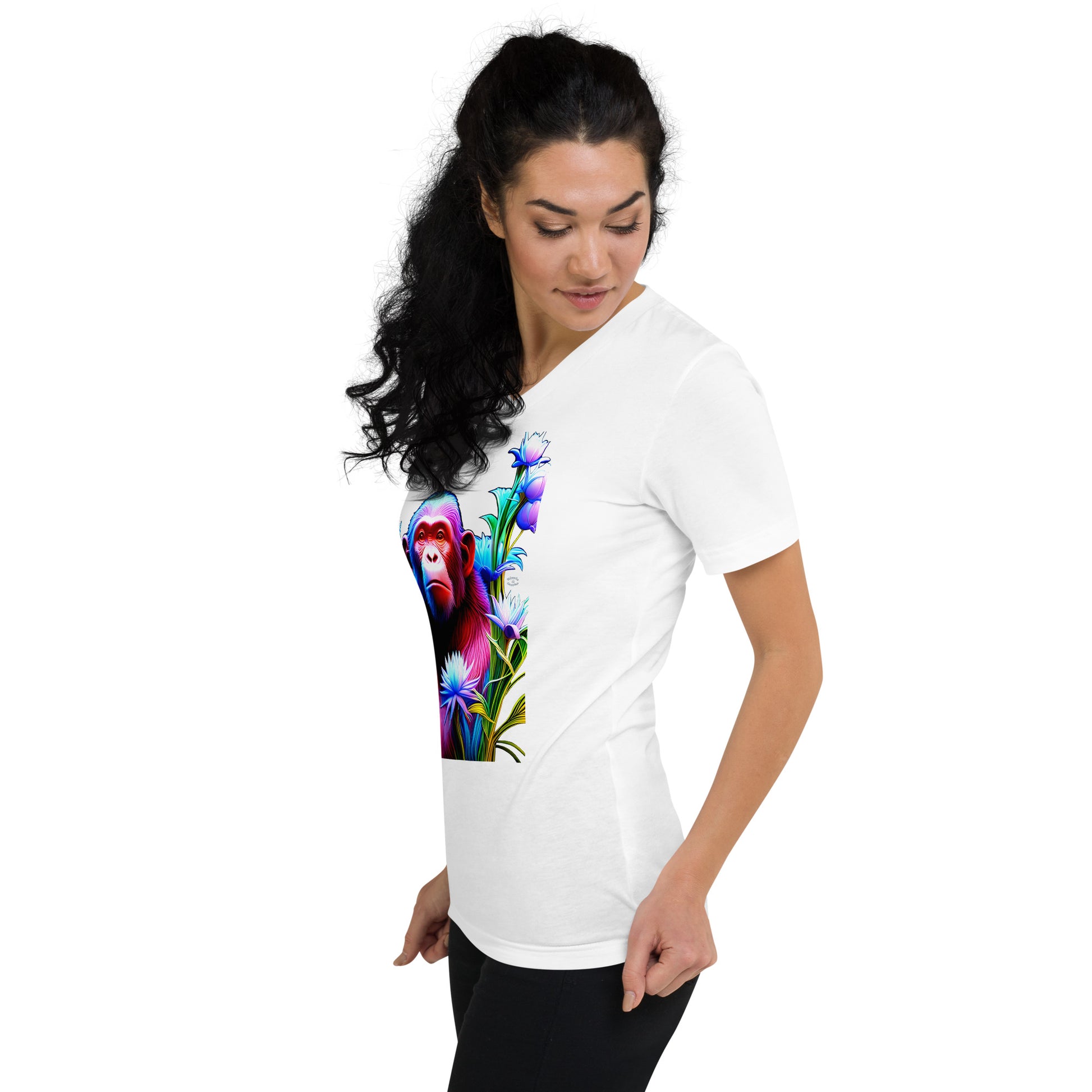 A picture of a woman wearing a v-neck short sleeve tshirt with a picture of a very colorful chimpanzee and flowers on the front - white - left front side