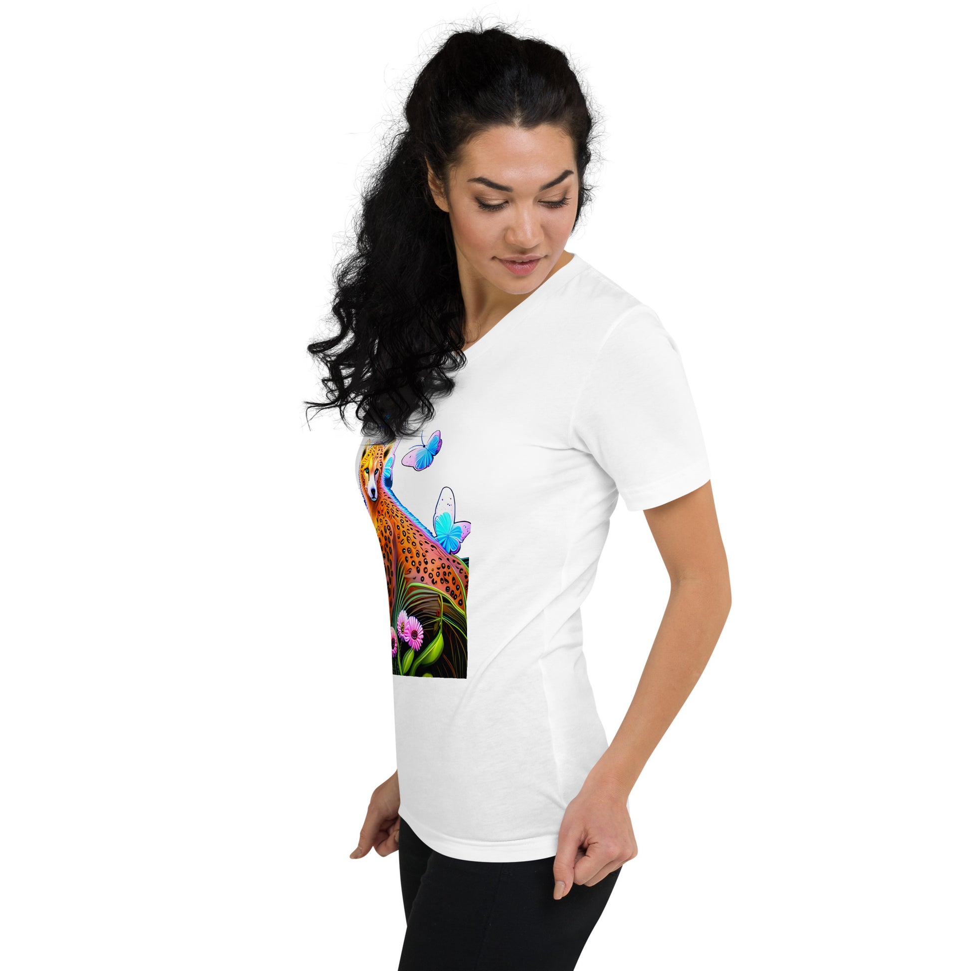 A picture of a woman wearing a tshirt with a cheetah surrounded by butterflies and sitting in colorful flowers - white left front