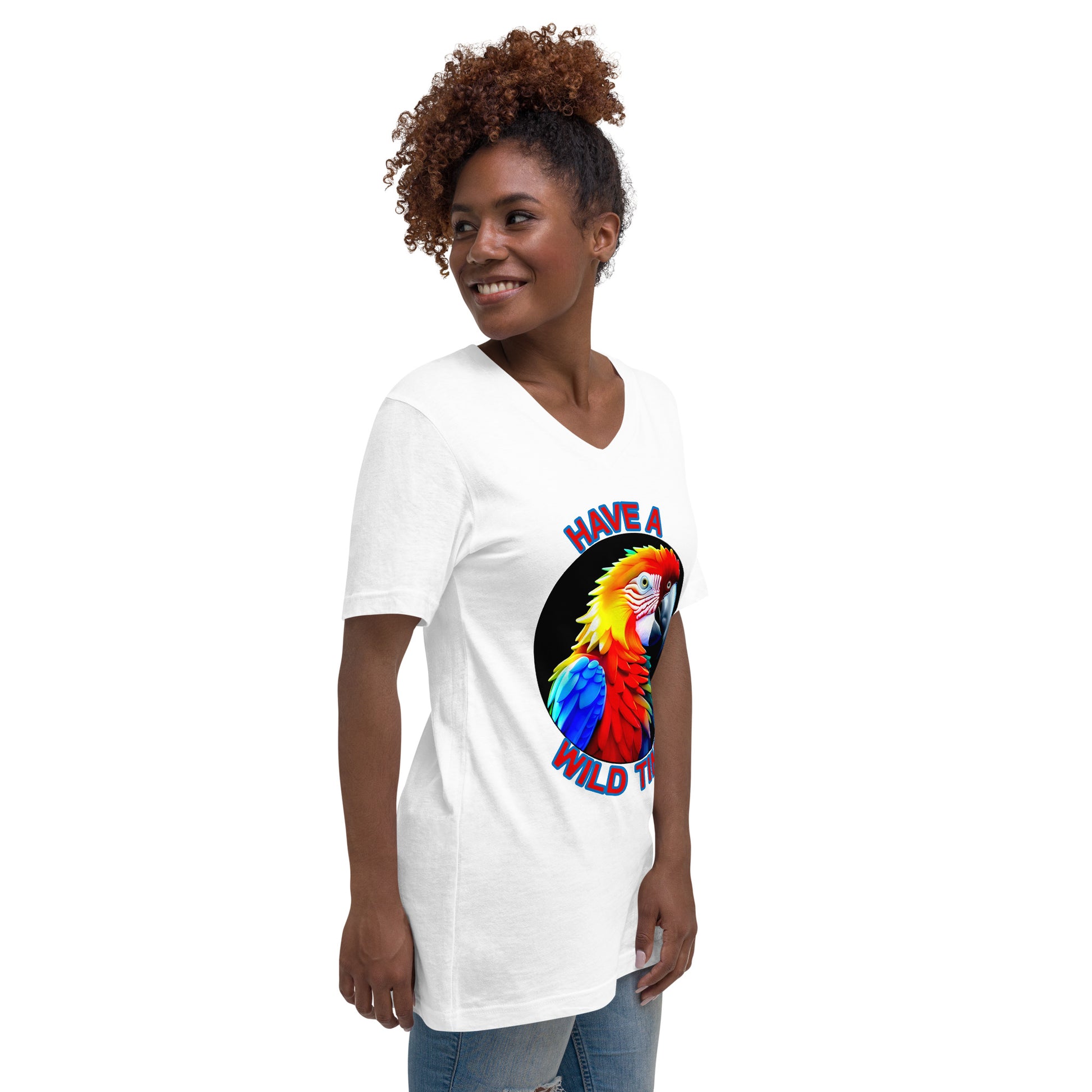 A picture of a women wearing a tshirt with the picture of a bright and colorful rainbow macaw parrot and the text HAVE A WILD TIME - white right front