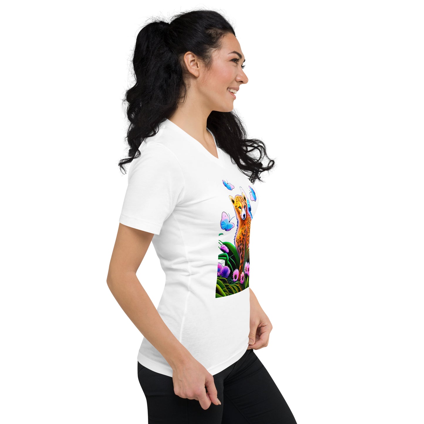 A picture of a woman wearing a tshirt with a cheetah surrounded by butterflies and sitting in colorful flowers - white right front