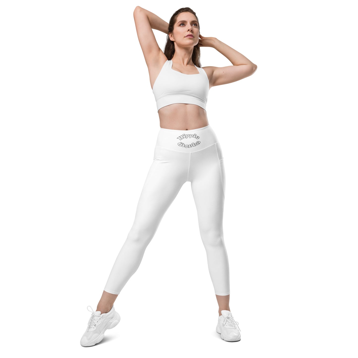 A picture of a woman standing in a yoga pose wearing White Leggings with Pockets - front side