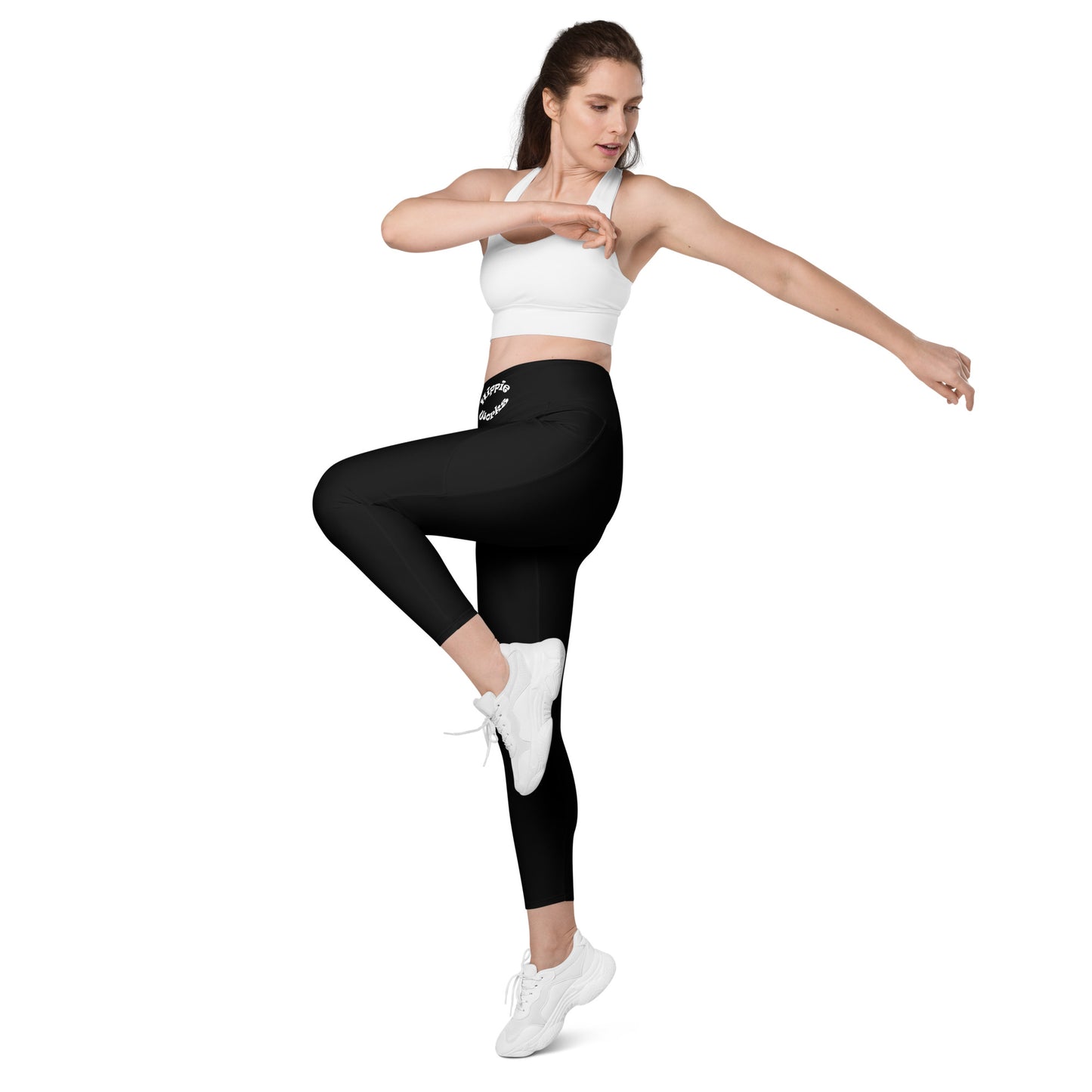 A picture of a woman standing in a yoga pose wearing Black Leggings with Pockets - left front side