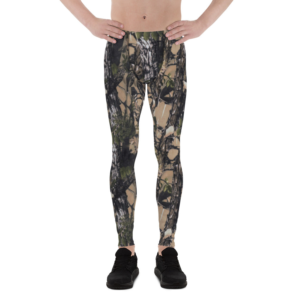 A picture of a man waist down wearing Camouflage all over print leggings - front side