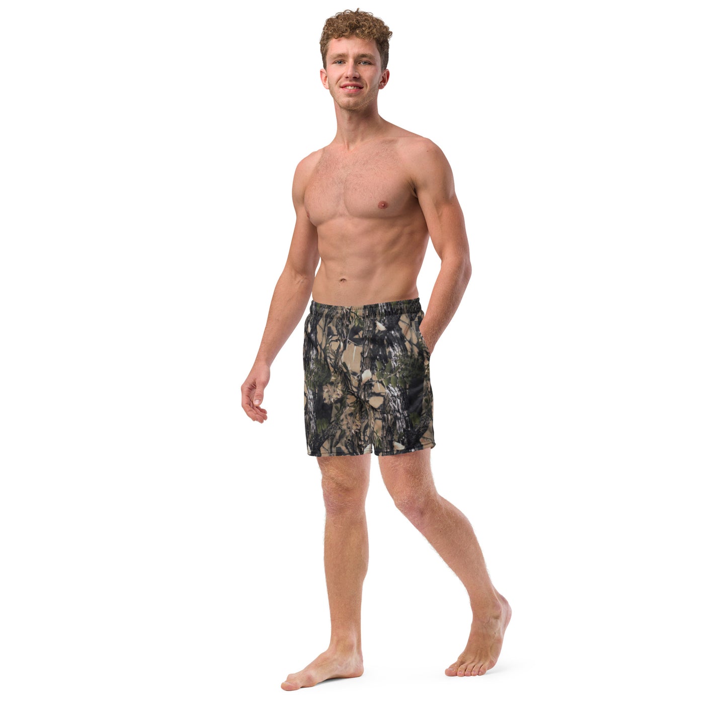A picture of a man wearing only Camouflage all over print swim trunks - left front side 