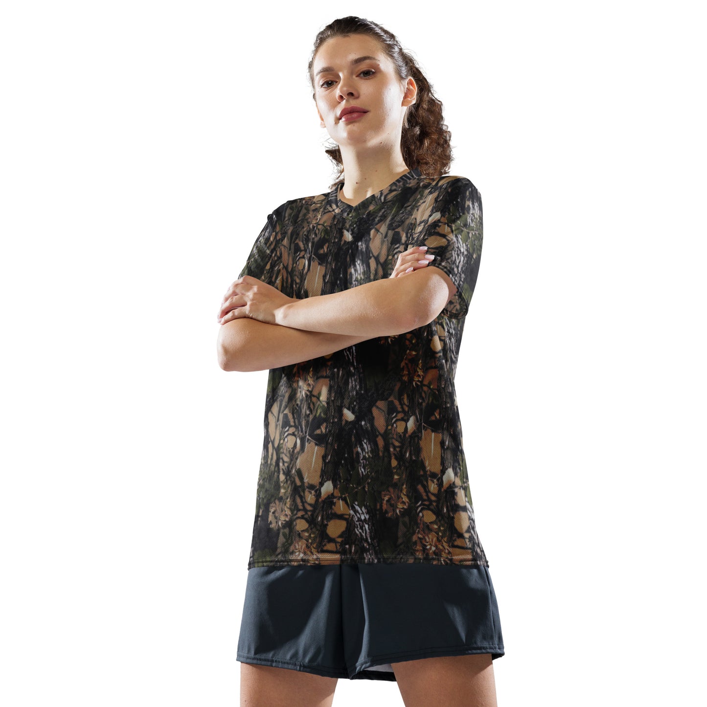 a picture of a woman wearing Camouflage all over print recycled Unisex sports jersey - front side