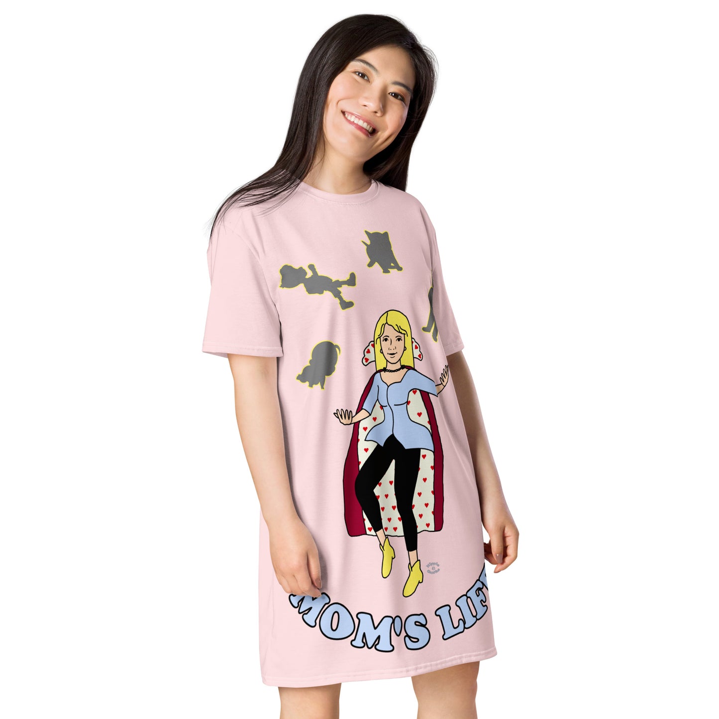 A women wearing a short sleeve tshirt dress which has on the front a cartoon women in a cape juggling her family like a jester and the text Mom's LIFE - right front - light pink