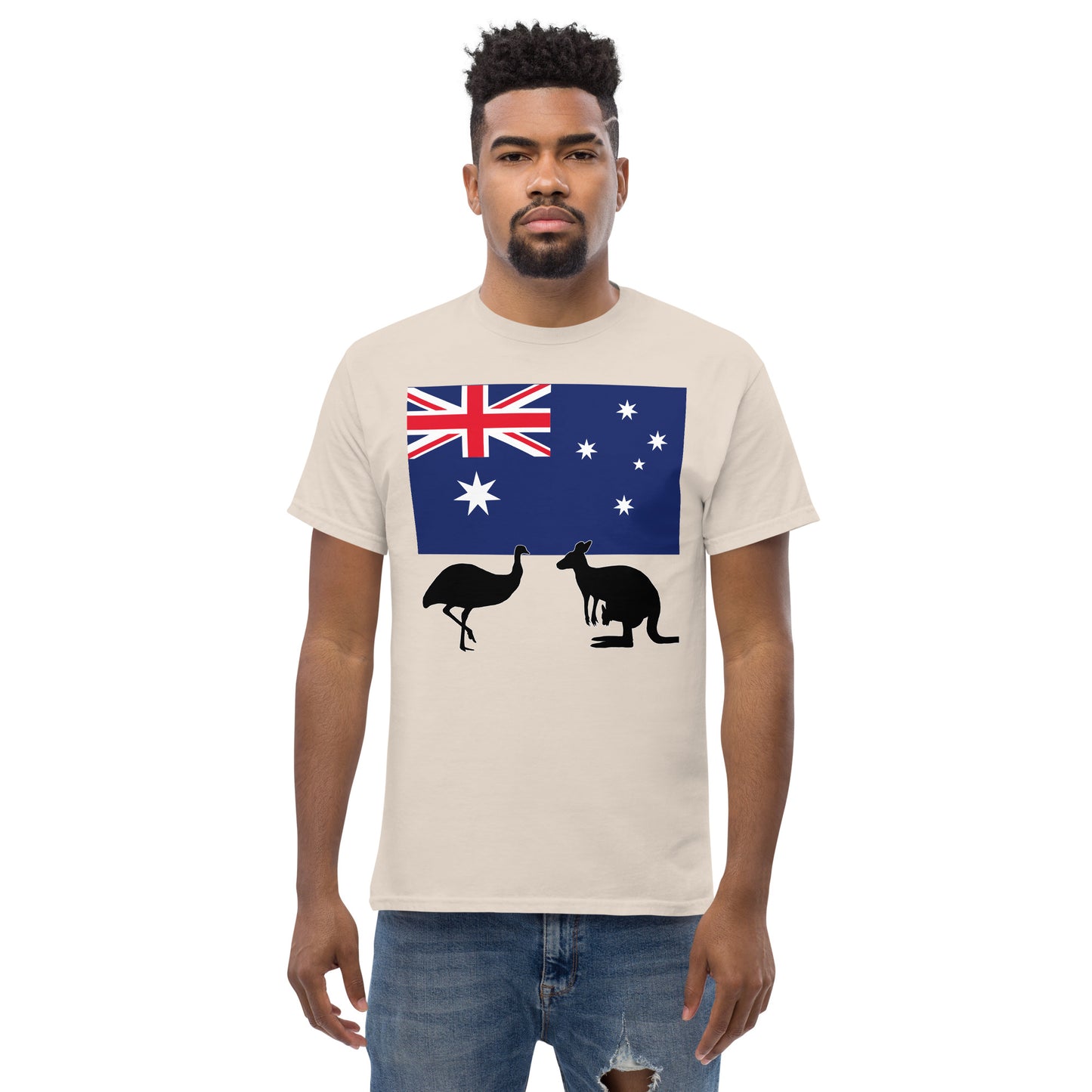 A man wearing a short sleeve tshirt and on the front is Australian flag on the front of a tshirt with the Australian Flag and the silhouettes of an Emu and a kangaroo below - Shirt color natural