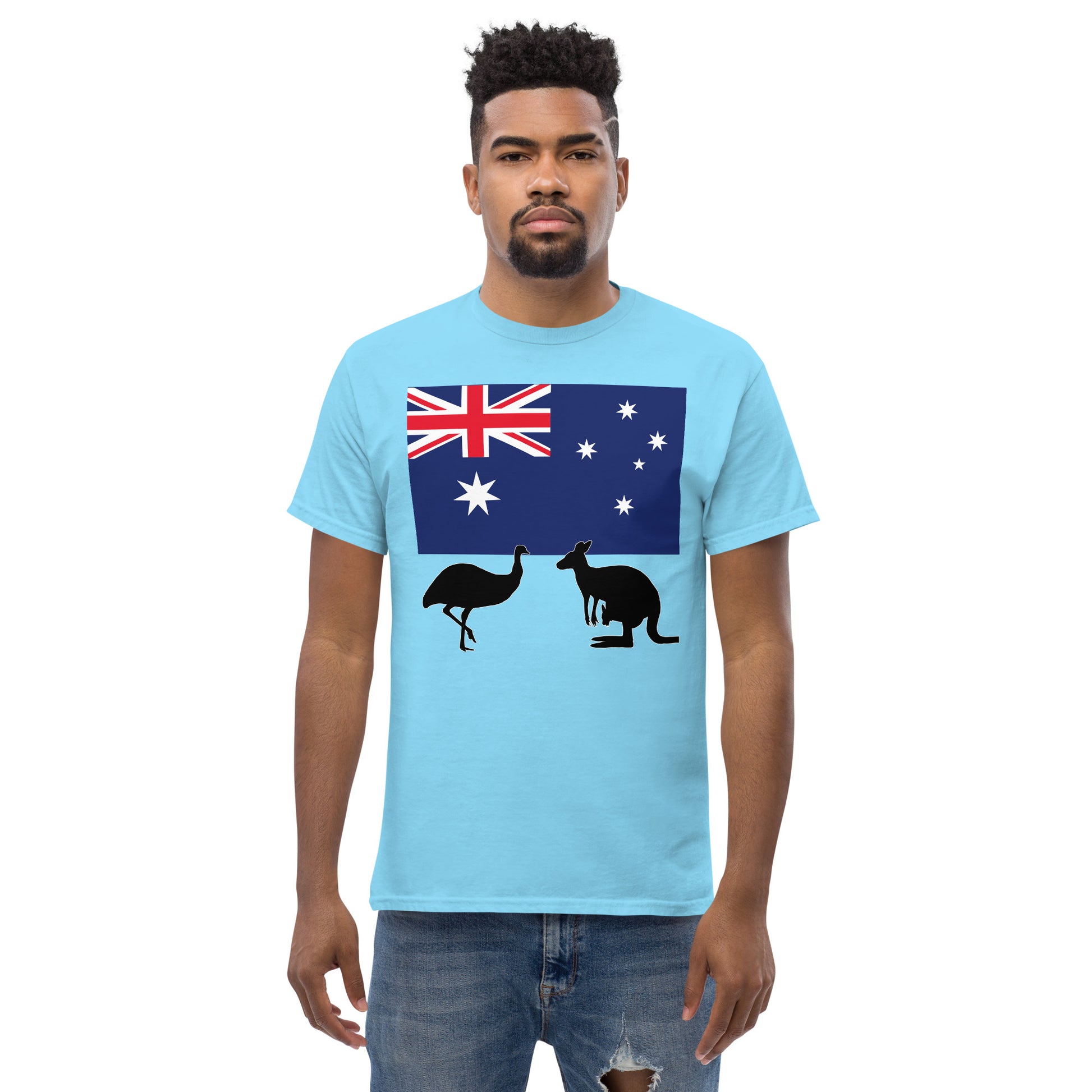 A man wearing a short sleeve tshirt and on the front is Australian flag on the front of a tshirt with the Australian Flag and the silhouettes of an Emu and a kangaroo below - Shirt color sky