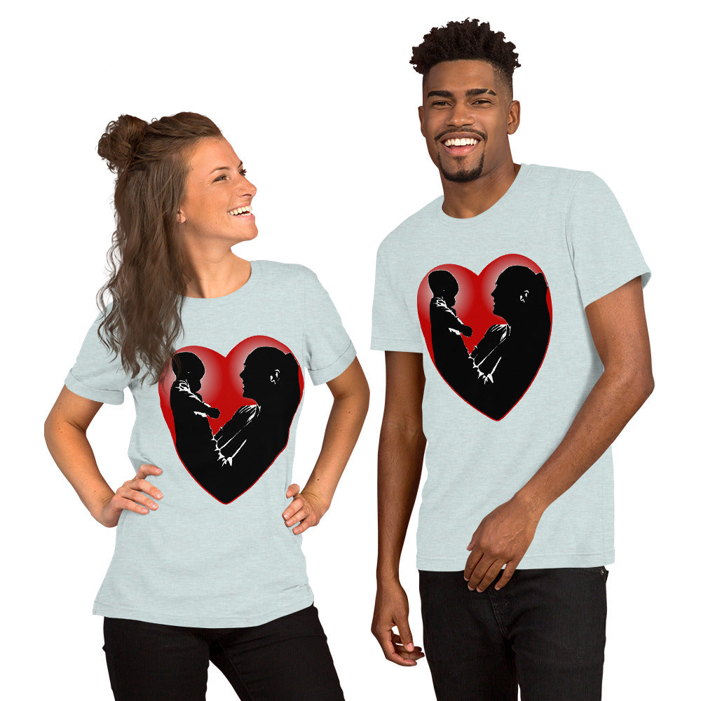 A man and a women wearing matching short sleeve tshirt with a picture on the front of a mother holding up a baby in silhouette with white light shining from behind and a red love heart framing them - Front - heather prism ice blue