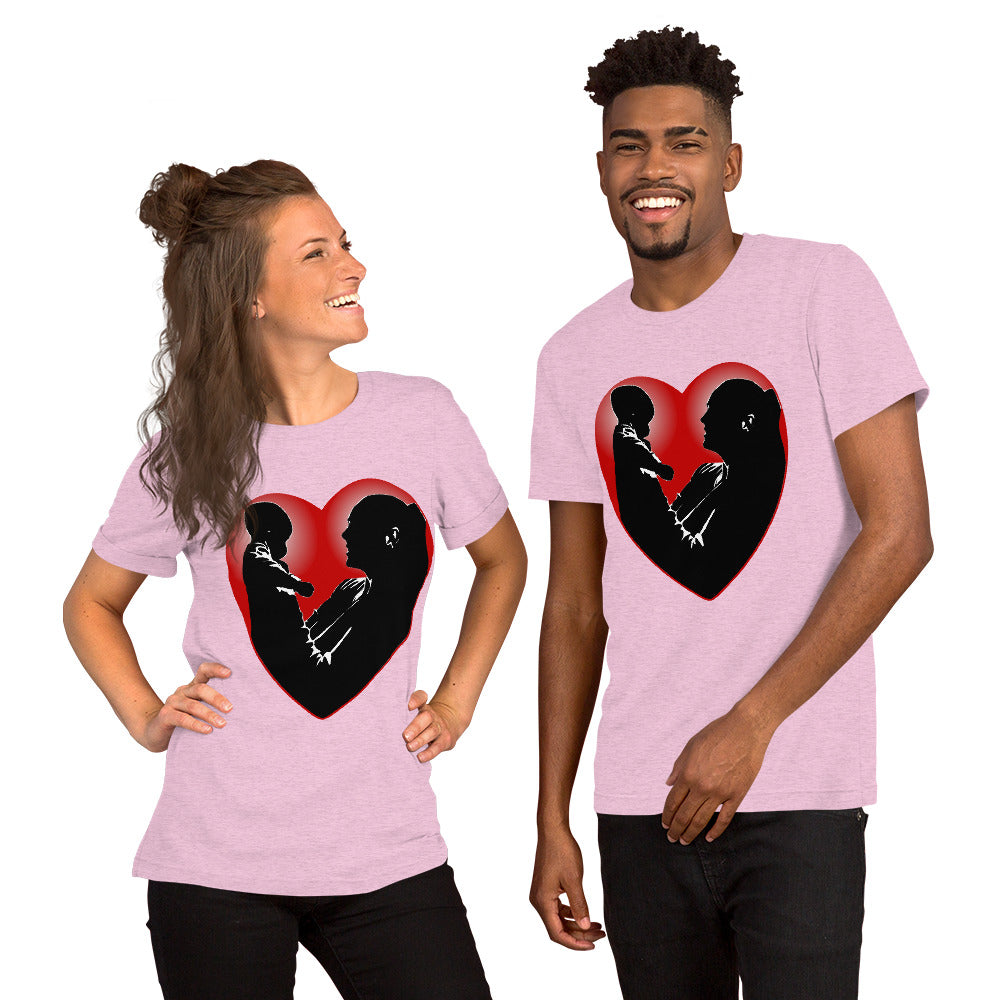 A man and a women wearing matching short sleeve tshirt with a picture on the front of a mother holding up a baby in silhouette with white light shining from behind and a red love heart framing them - Front - heather prism lilac