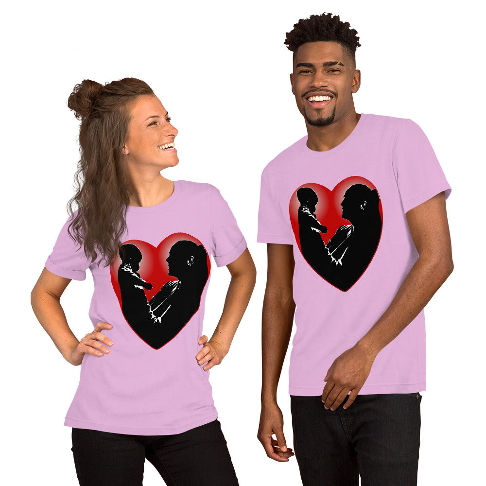 A man and a women wearing matching short sleeve tshirt with a picture on the front of a mother holding up a baby in silhouette with white light shining from behind and a red love heart framing them - Front - lilac