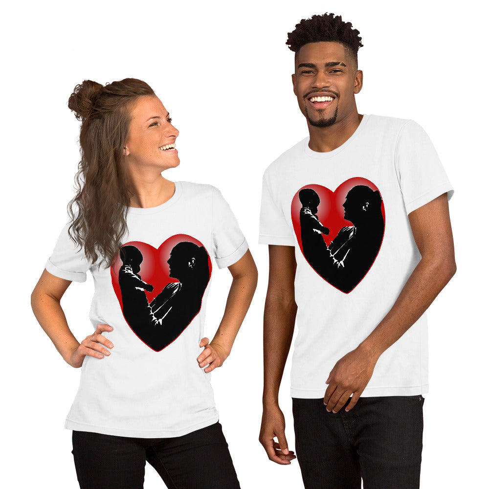 A man and a women wearing matching short sleeve tshirt with a picture on the front of a mother holding up a baby in silhouette with white light shining from behind and a red love heart framing them - Front - white