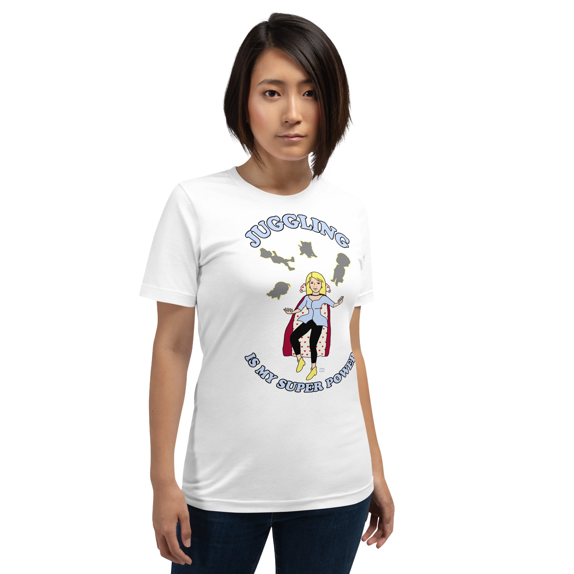 A women wearing a unisex short sleeve tshirt which has on the front a cartoon women in a cape juggling her family like a jester and the text Juggling Is My Super Power - front - white