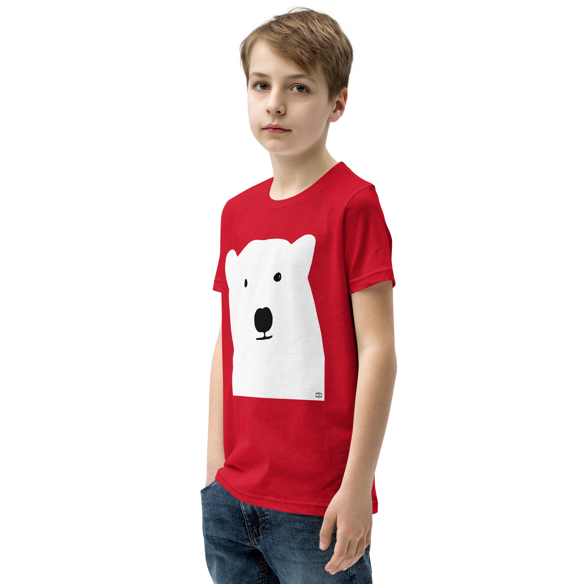 A picture of a young boy wearing a short sleeve tshirt with a kool polar bear face on the front-red-left-front