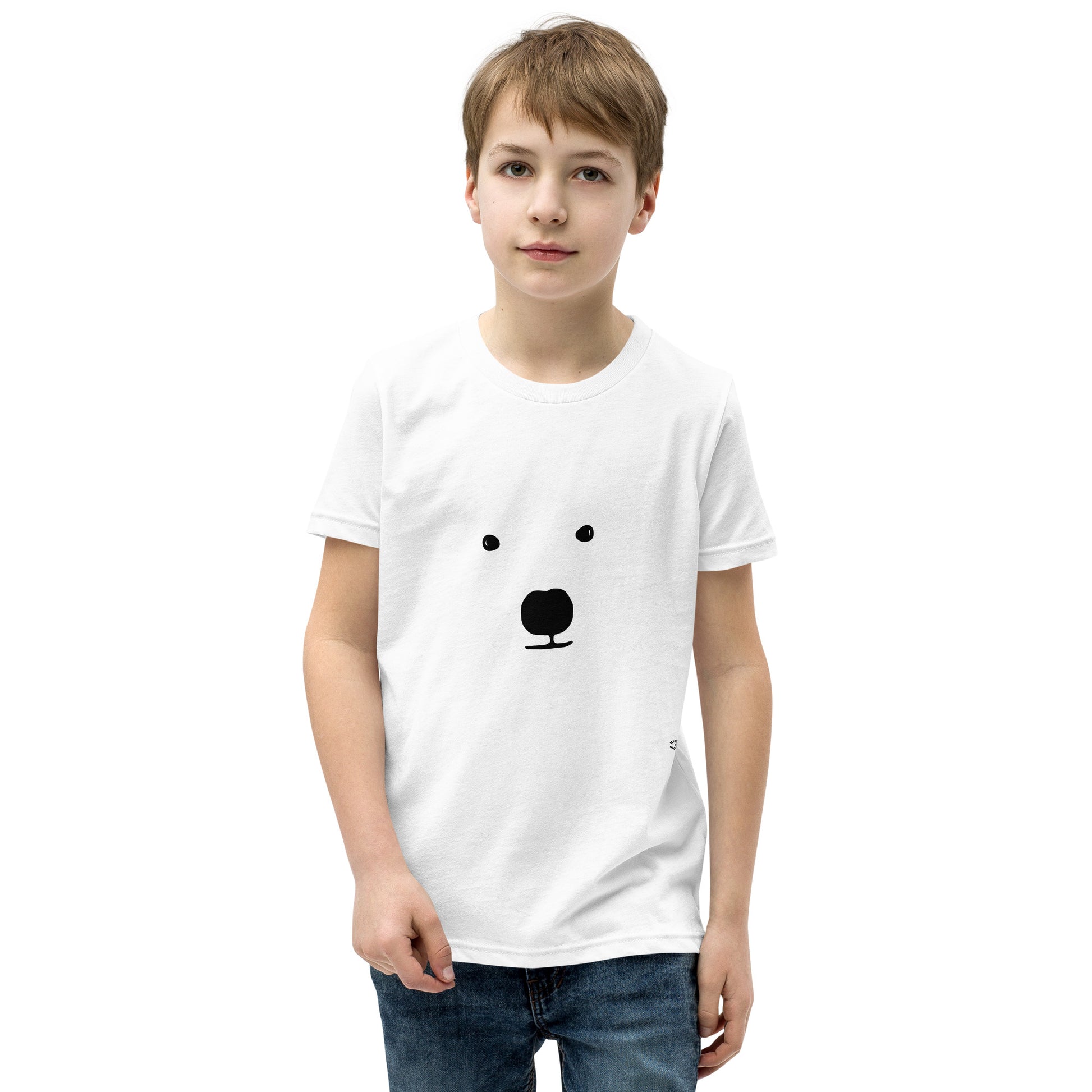 A picture of a young boy wearing a short sleeve tshirt with a kool polar bear face on the front-white-front